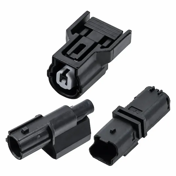 Three automotive connector housings